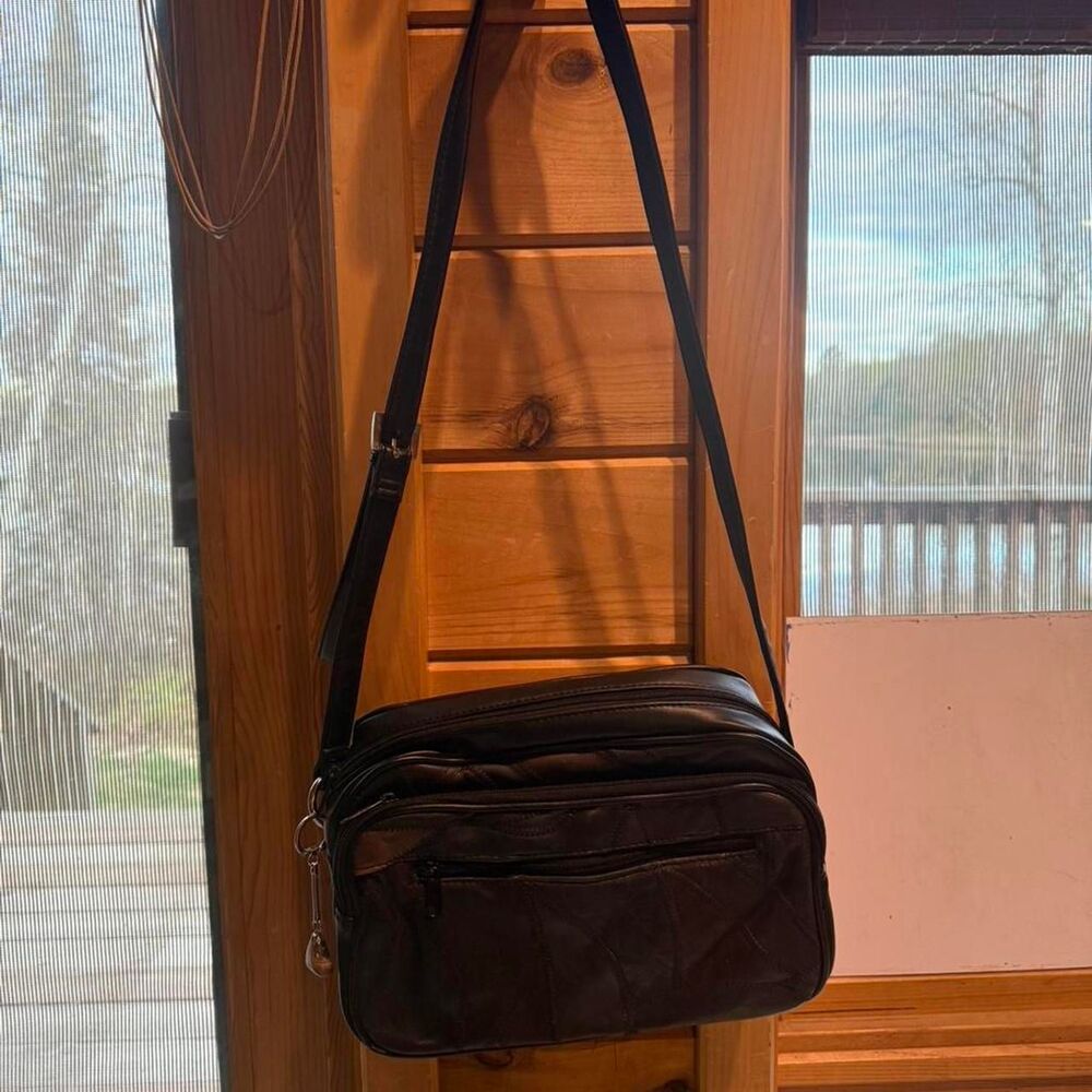 Jacklyn Smith Black leather patchwork crossbody bag with multiple pockets